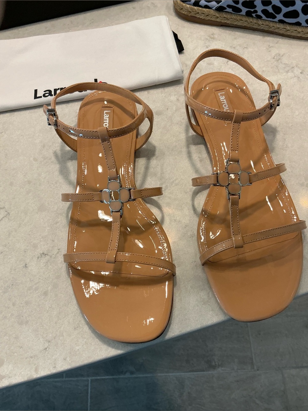 Larroude Patent Leather T-Strap Sandals with Floral Accent no offers
